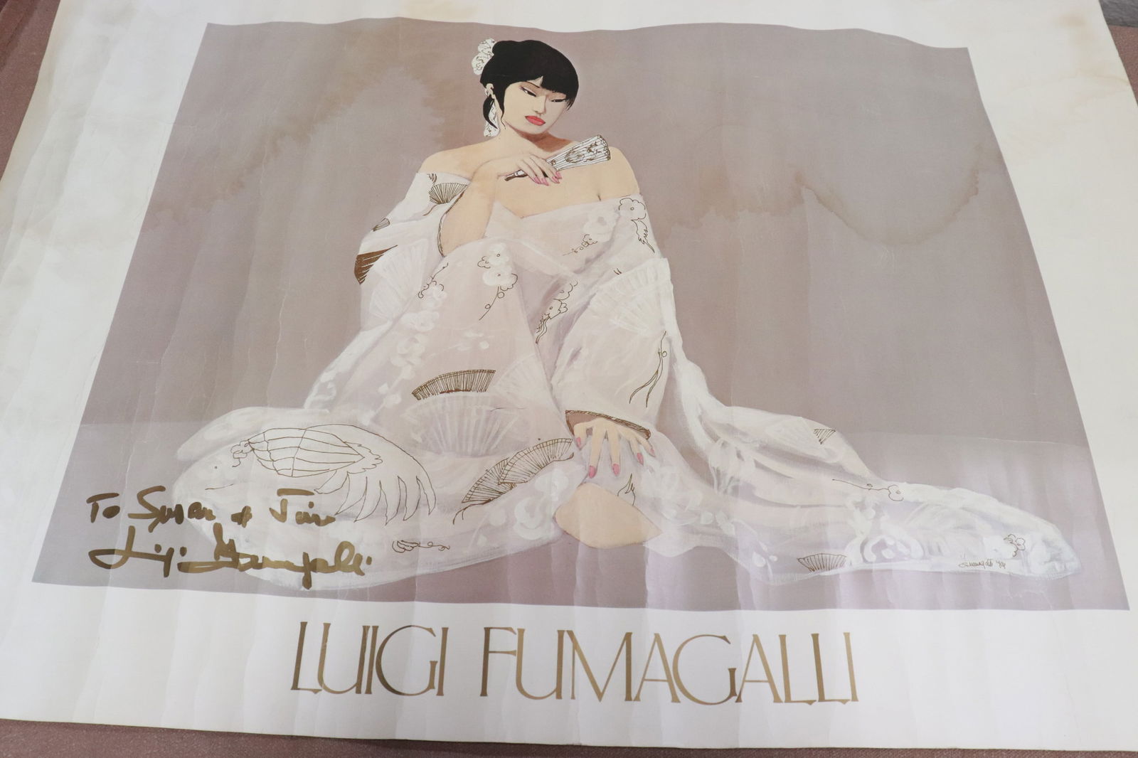 a signed etching, and 3 posters - 2