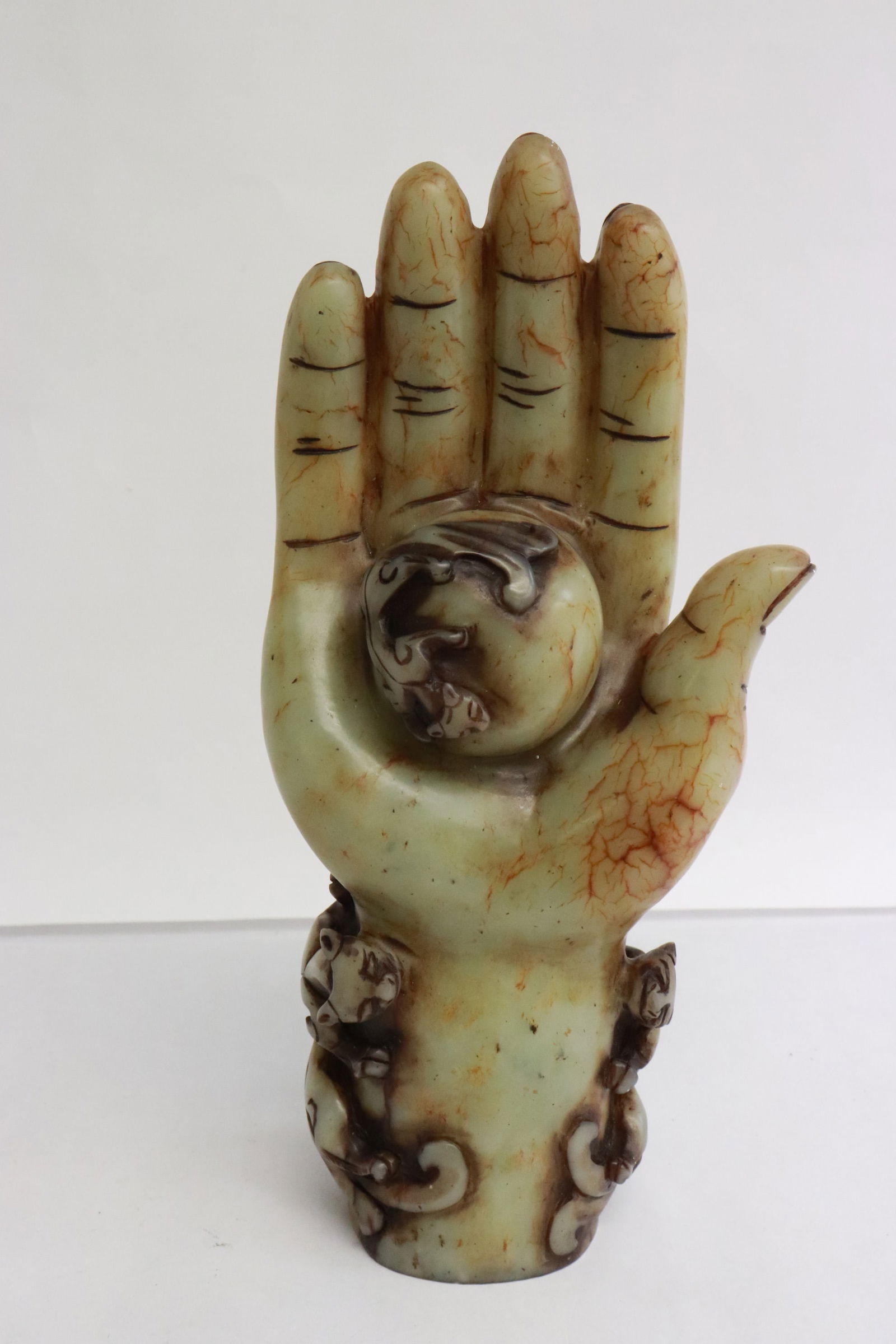 Jade like stone carved Buddha hand: Jade like stone carved Buddha hand, 9.7"L