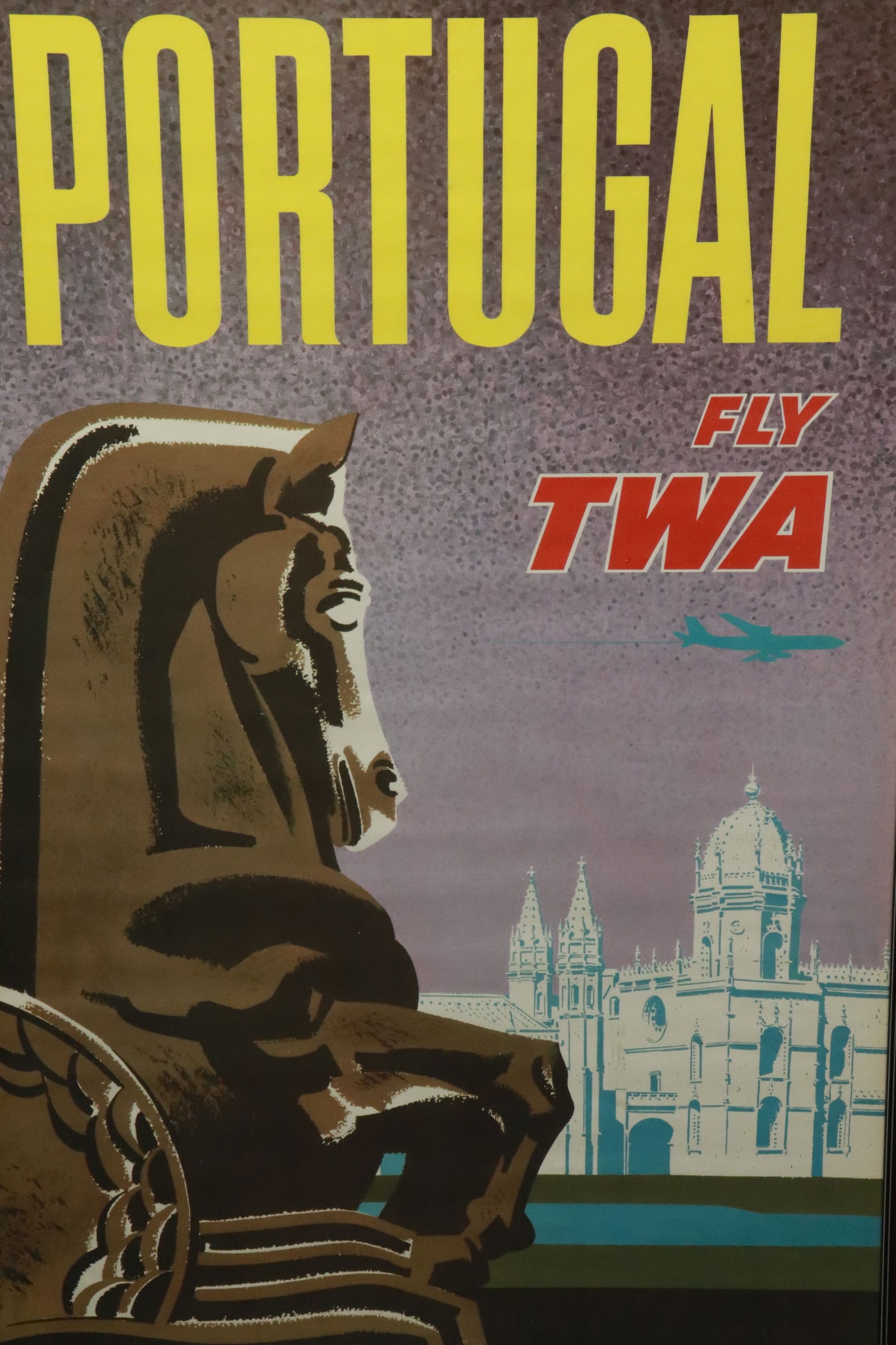 A framed TWA poster - 2