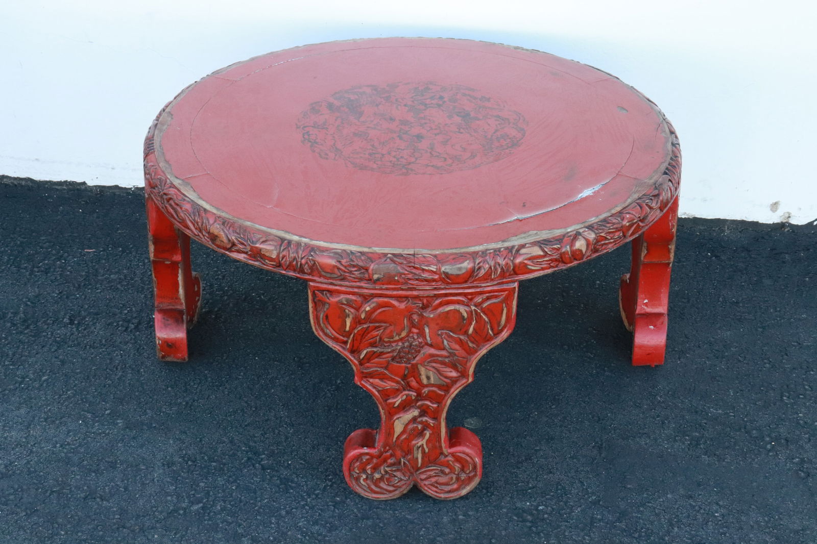 A painted red lacquer round table, lacquer chips (1 of 6)