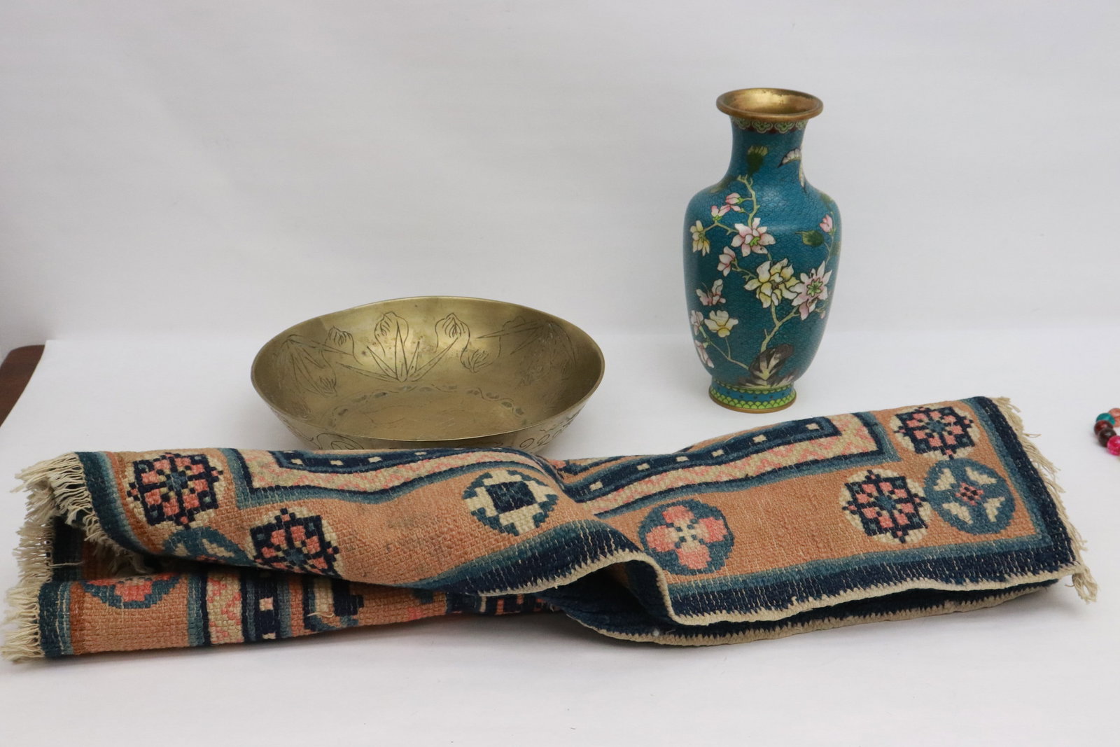 a Chinese rug, a cloisonne vase, & a vintage brass plate: 3 pieces; a Chinese rug (23.5"x26"), a cloisonne vase (9.3"x4.75"dia), and a vintage brass plate (2.3"x9.9"dia)