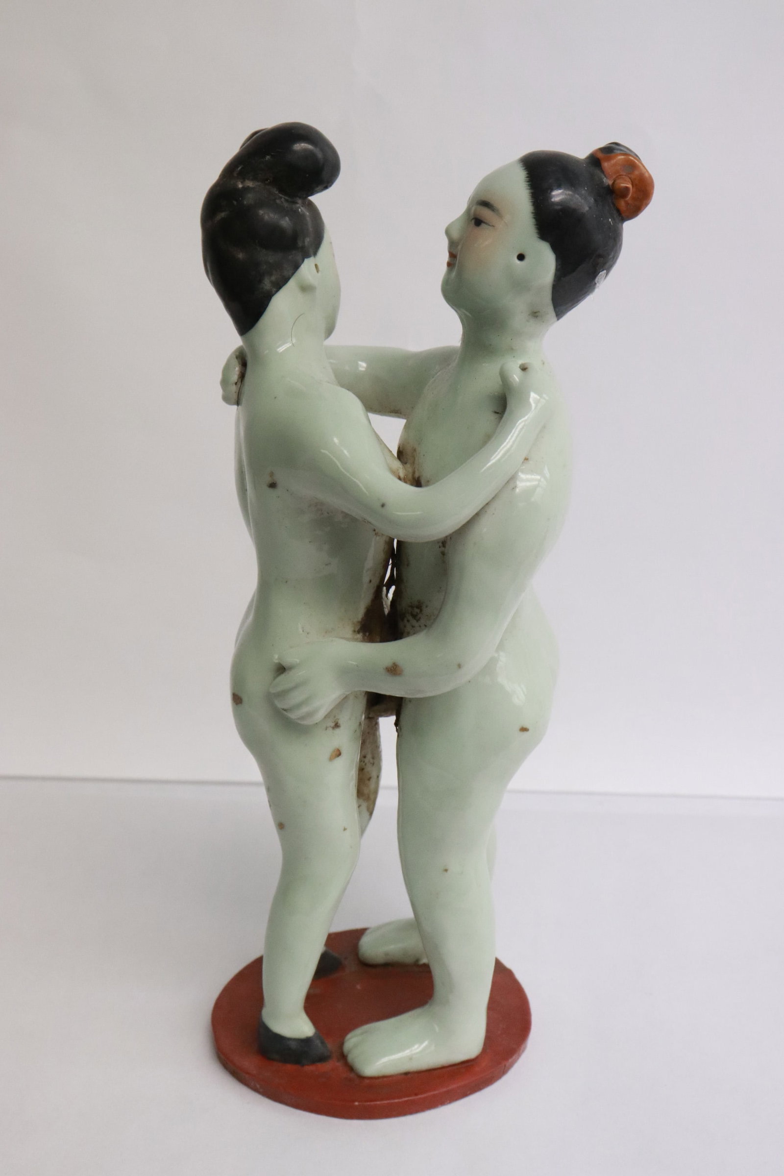 A porcelain sculpture of figure group: A porcelain sculpture of figure group, 9.25"H