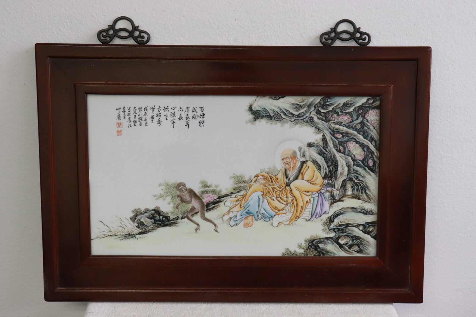 A beautiful framed famille rose porcelain plaque: A beautiful framed famille rose porcelain plaque, 12"x21.35" (F:19.2"x28.6"x1.15")