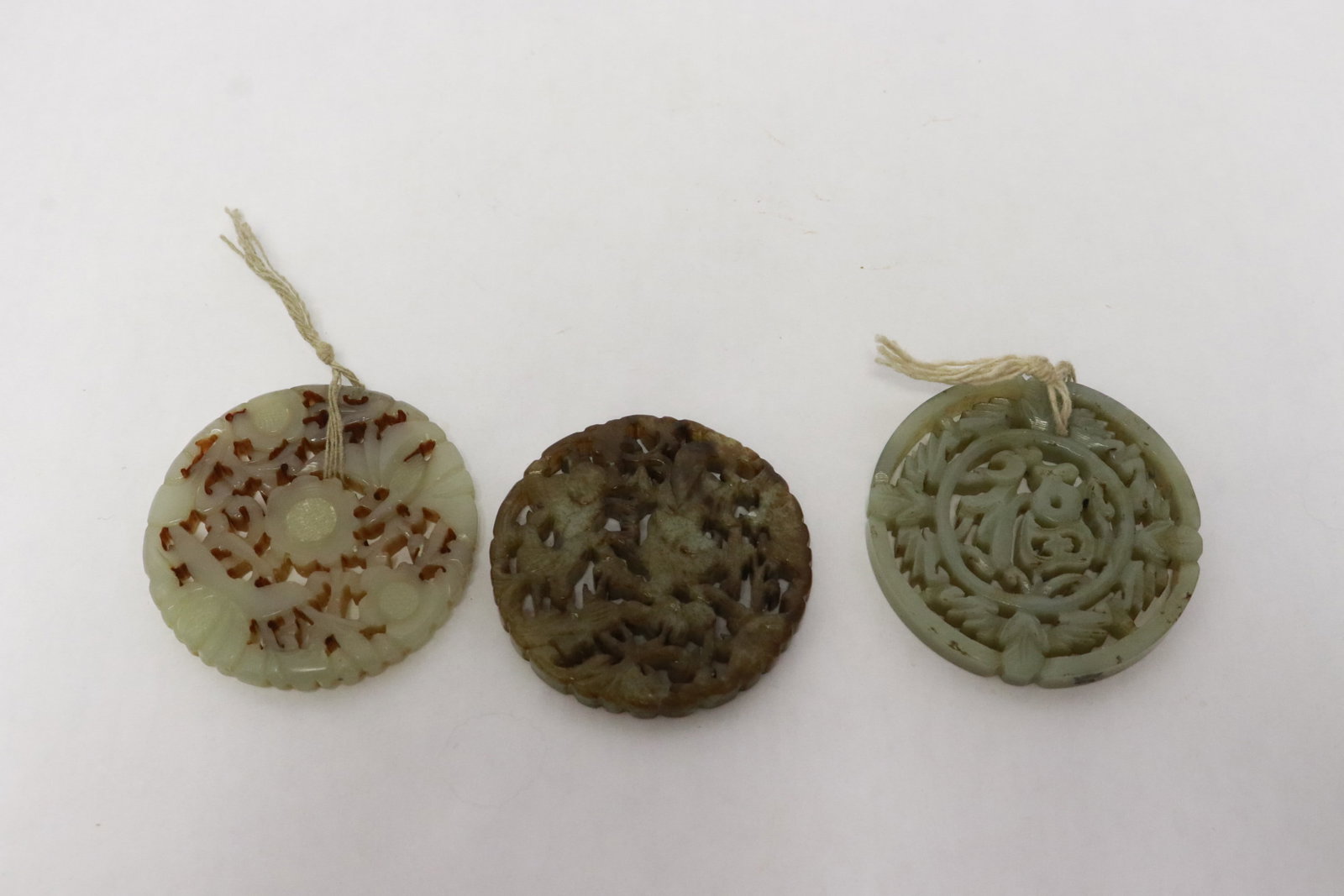 3 pieces jade like stone discs (1 of 10)