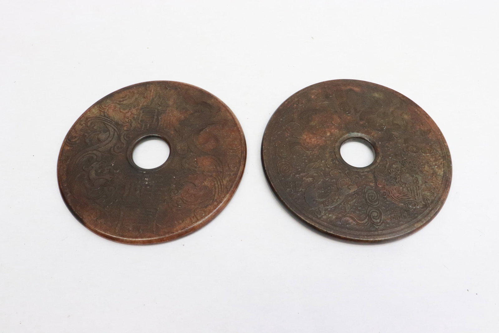 2 large stone carved discs (1 of 7)