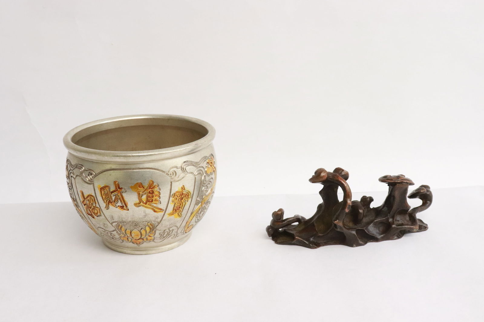 2 pieces; a bronze brush mountain, and a white bronze bowl: 2 pieces; a bronze brush mountain (2.15"x4.7"x1.7"), and a white bronze bowl (2.8"x3.7"dia)