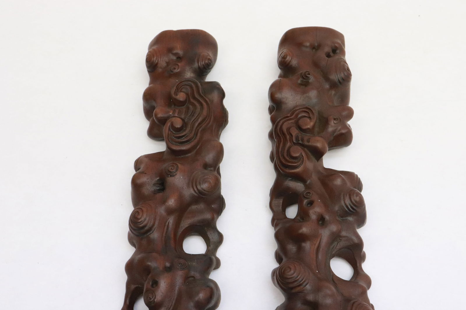 Pair large wood scroll weights - 2