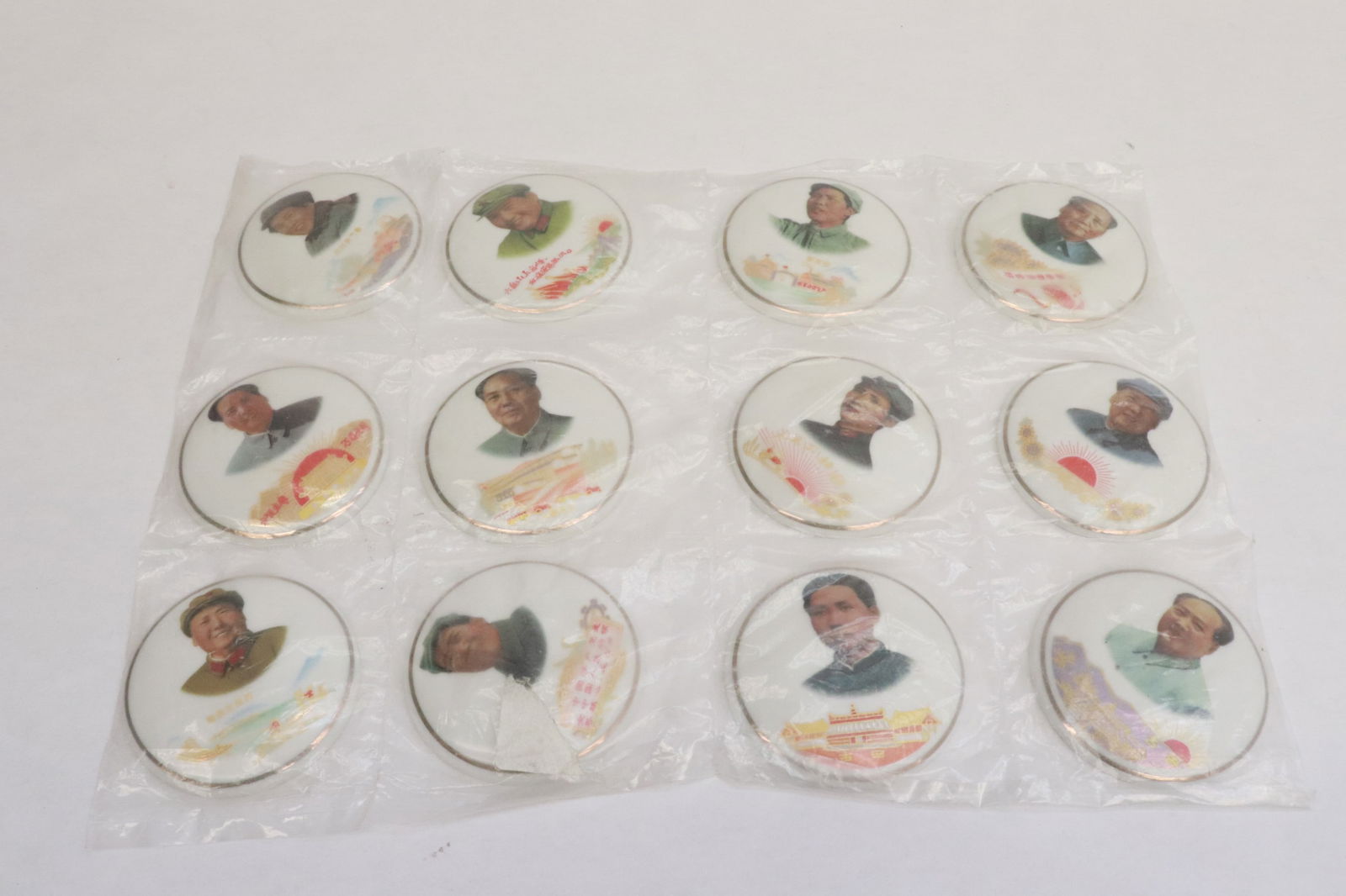 12 Chinese porcelain portrait plaques: 12 Chinese porcelain portrait plaques, 0.35"x2.4"dia ea