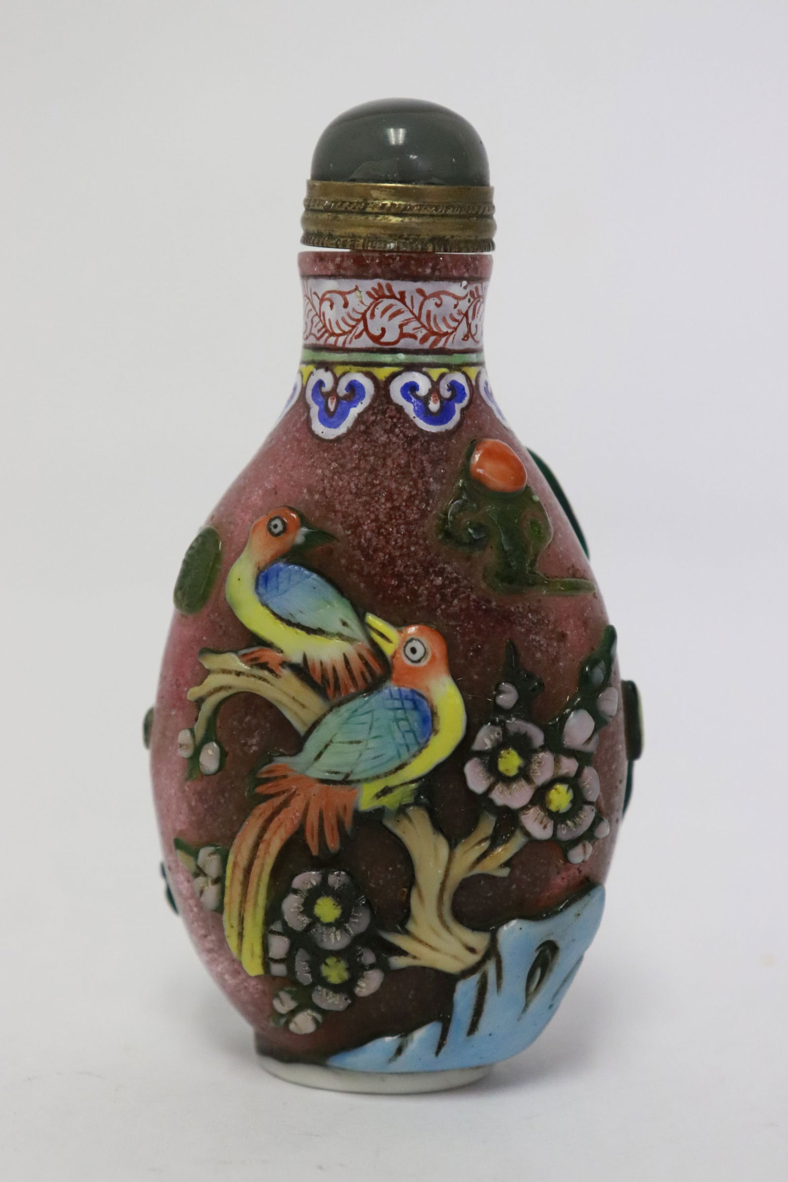 A polychrome Peking glass overlay snuff bottle (1 of 6)