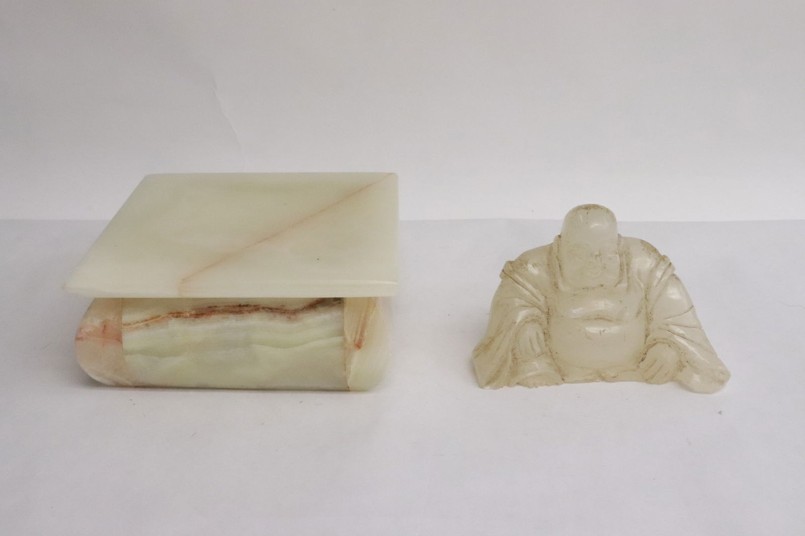 an onyx box, and a Peking glass Buddha: 2 pieces; an onyx box (2.25"x5"x5"), and a Peking glass Buddha (2.8"H)