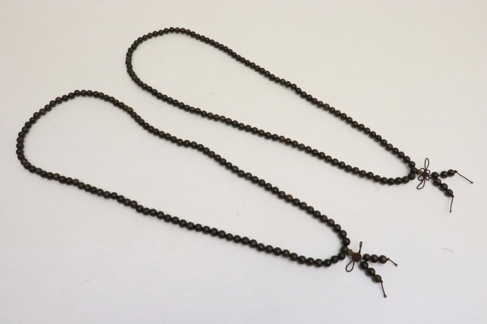 2 agarwood like bead necklaces: 2 agarwood like bead (0.3"x0.3"dia ea) necklaces (34"L ea)
