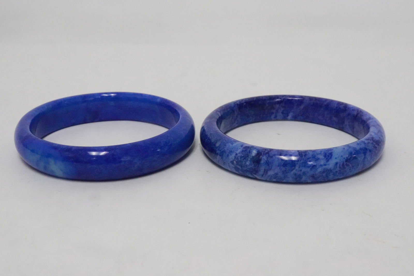 2 lapis bangles: 2 lapis bangles, 0.63"x3.2"dia, 0.6"x3.3"dia