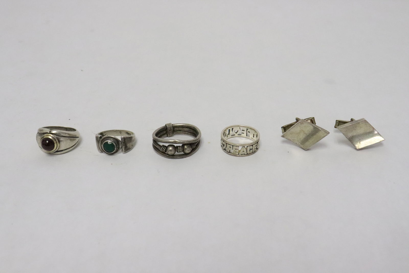 4 sterling rings, & pair Taxco sterling cufflinks: 4 vintage sterling rings, and pair Taxco sterling cufflinks, wt. 27.5gm