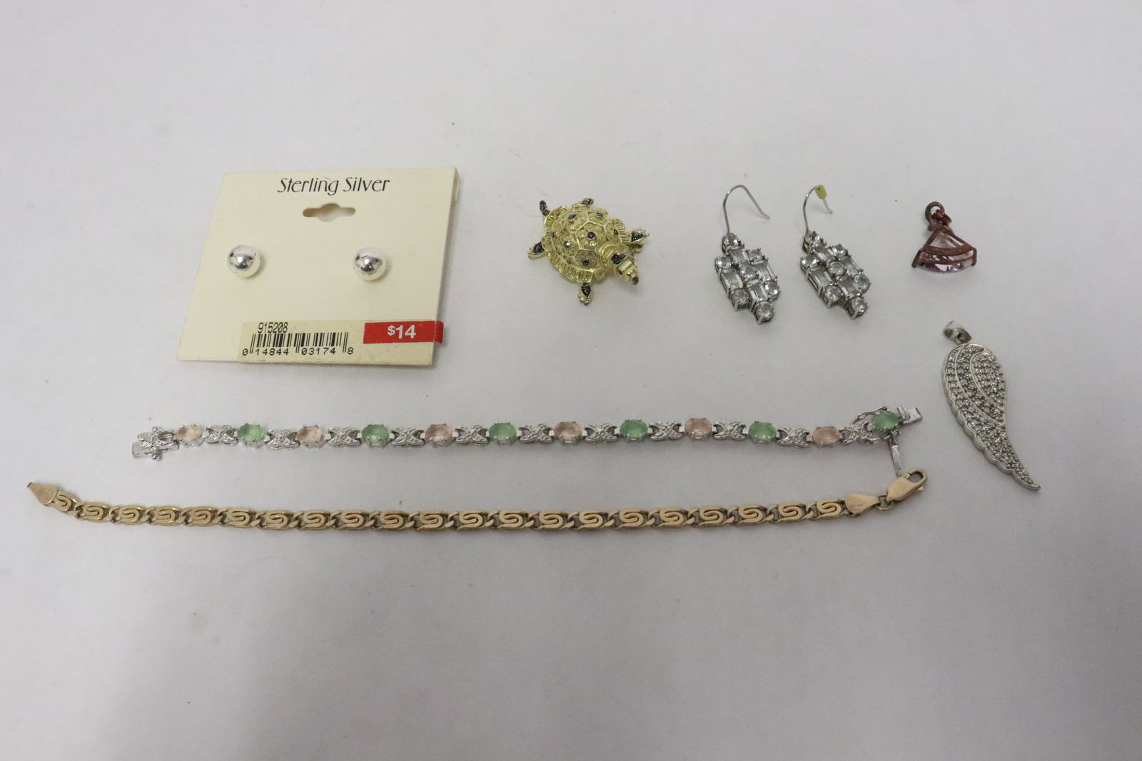 7 sterling items: 7 sterling items; 2 bracelets, 2 pendants, a brooch, and 2 pairs of earrings, total wt. 38.4gm