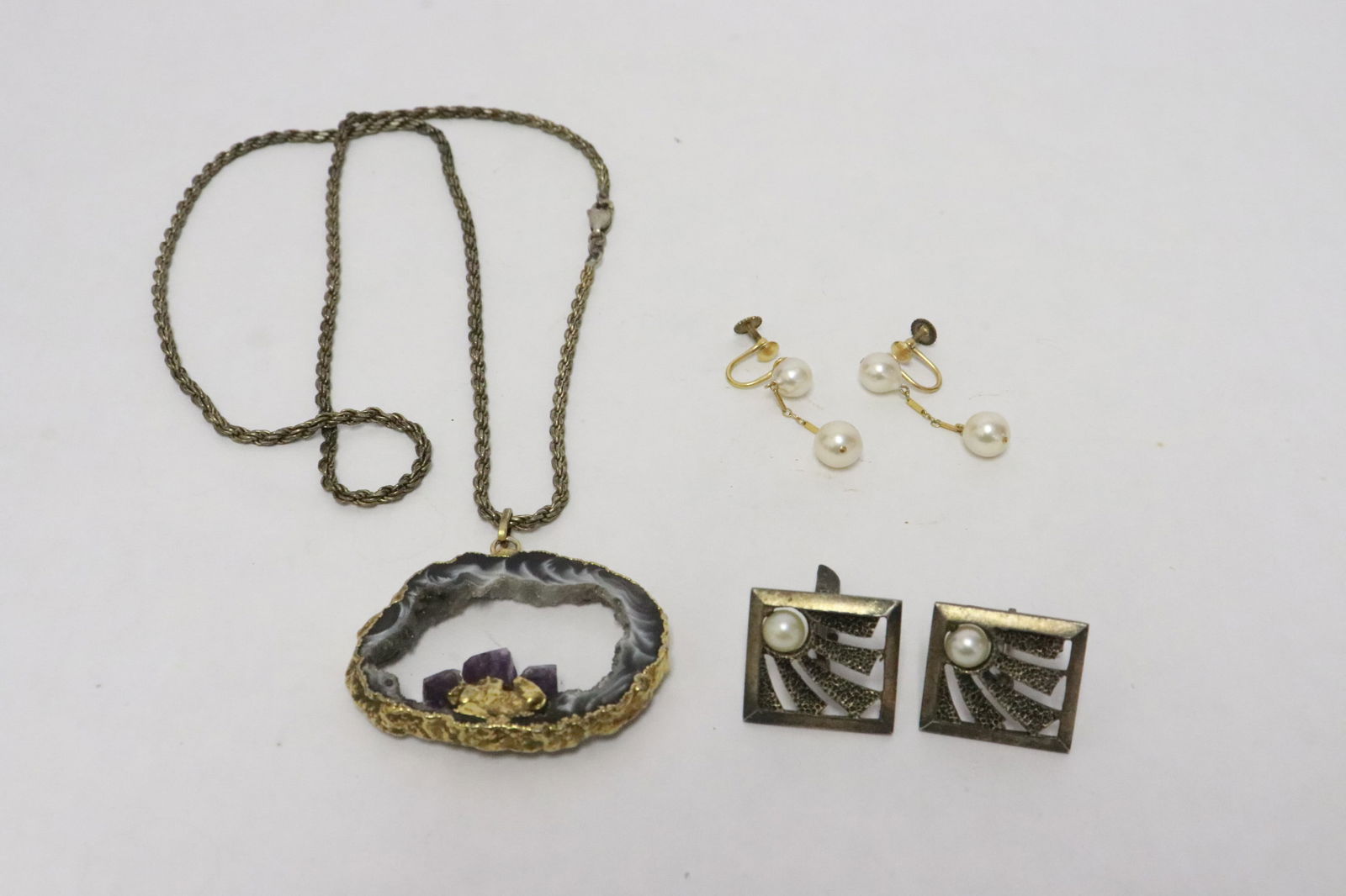 3 items: 3 items; pair sterling cufflinks with cultured pearl (6.5mm diameter), pair gold filled earrings with cultured pearls (8.5mm and 7mm diameter), and a geo pendant with sterling necklace, total wt.