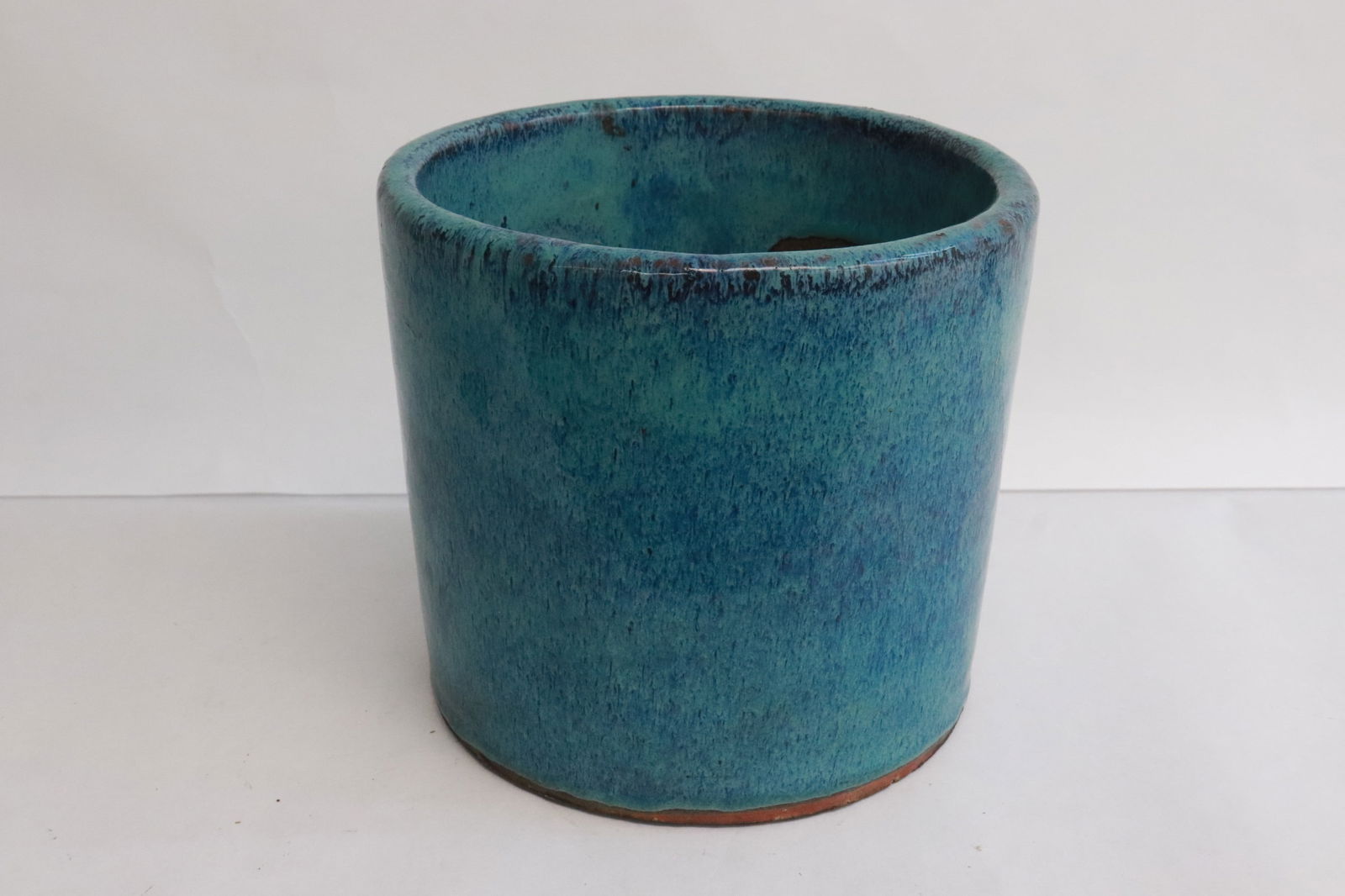 Chinese 19th c. earthenware brush holder, Daoguang period: Chinese 19th century blue glazed earthenware brush holder, Daoguang period, 6.1"x6.7"dia