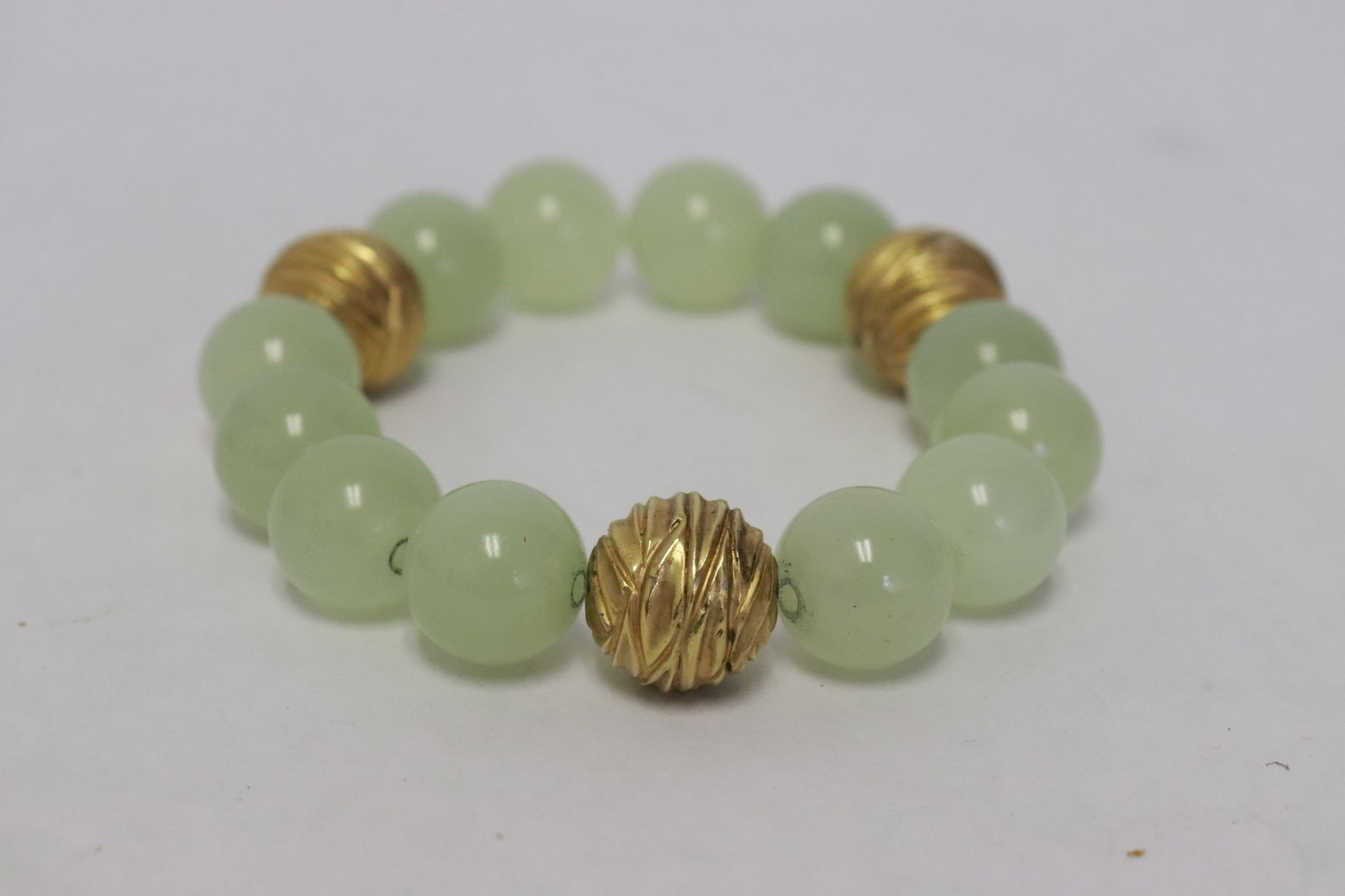 An antique jade bead bracelet w/ gilt silver beads spacers (1 of 6)