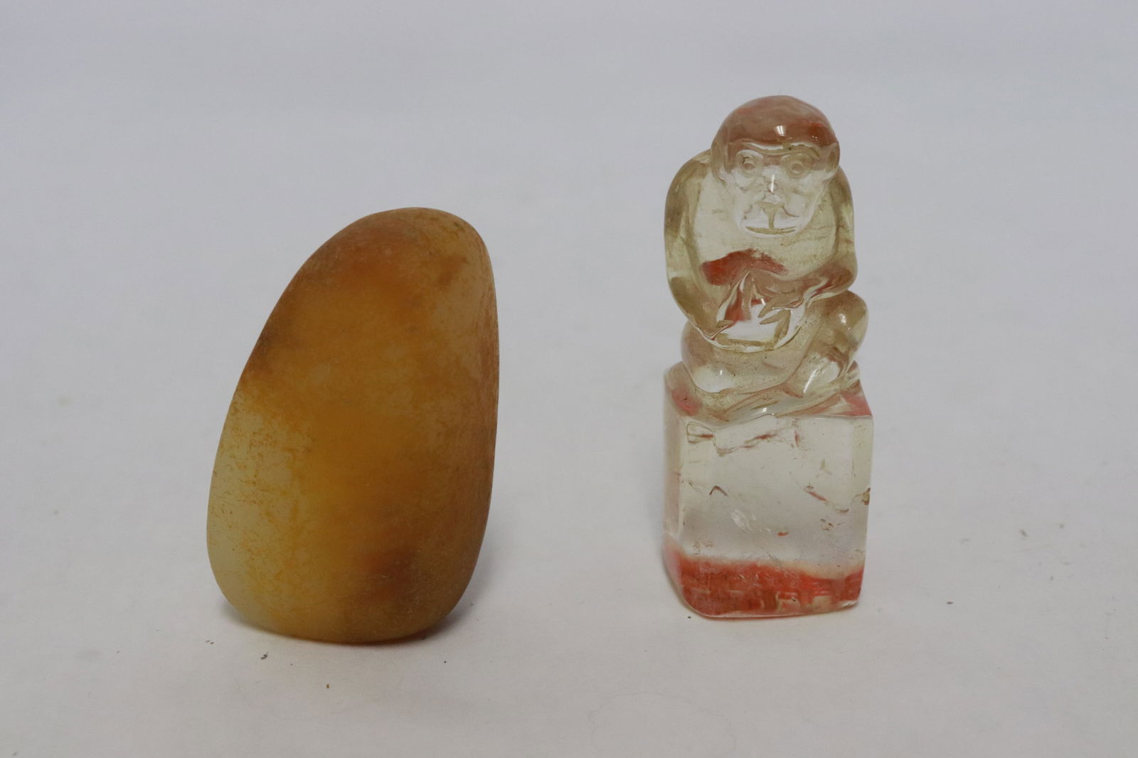 a stone ornament, and a crystal seal (1 of 9)
