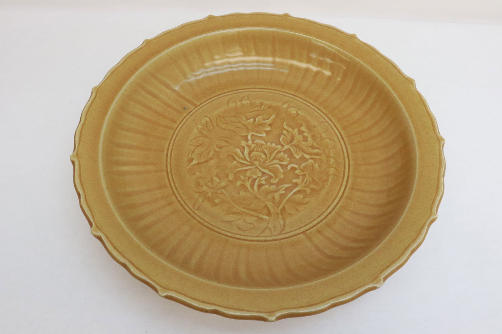 Chinese light brown glazed porcelain charger: Chinese light brown glazed porcelain charger, 3.15"x16.4"dia
