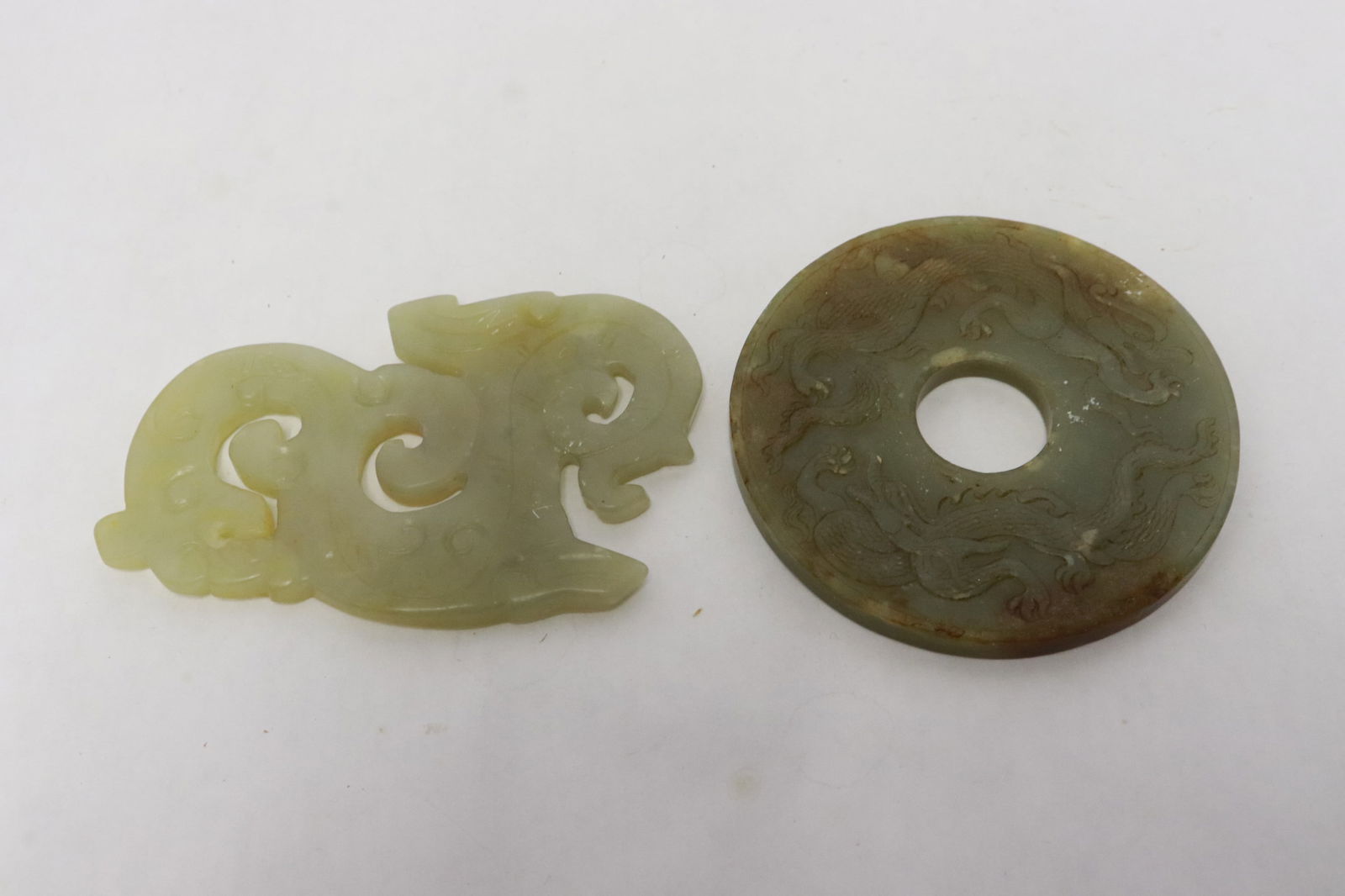 2 jade like stone carved ornaments (1 of 8)