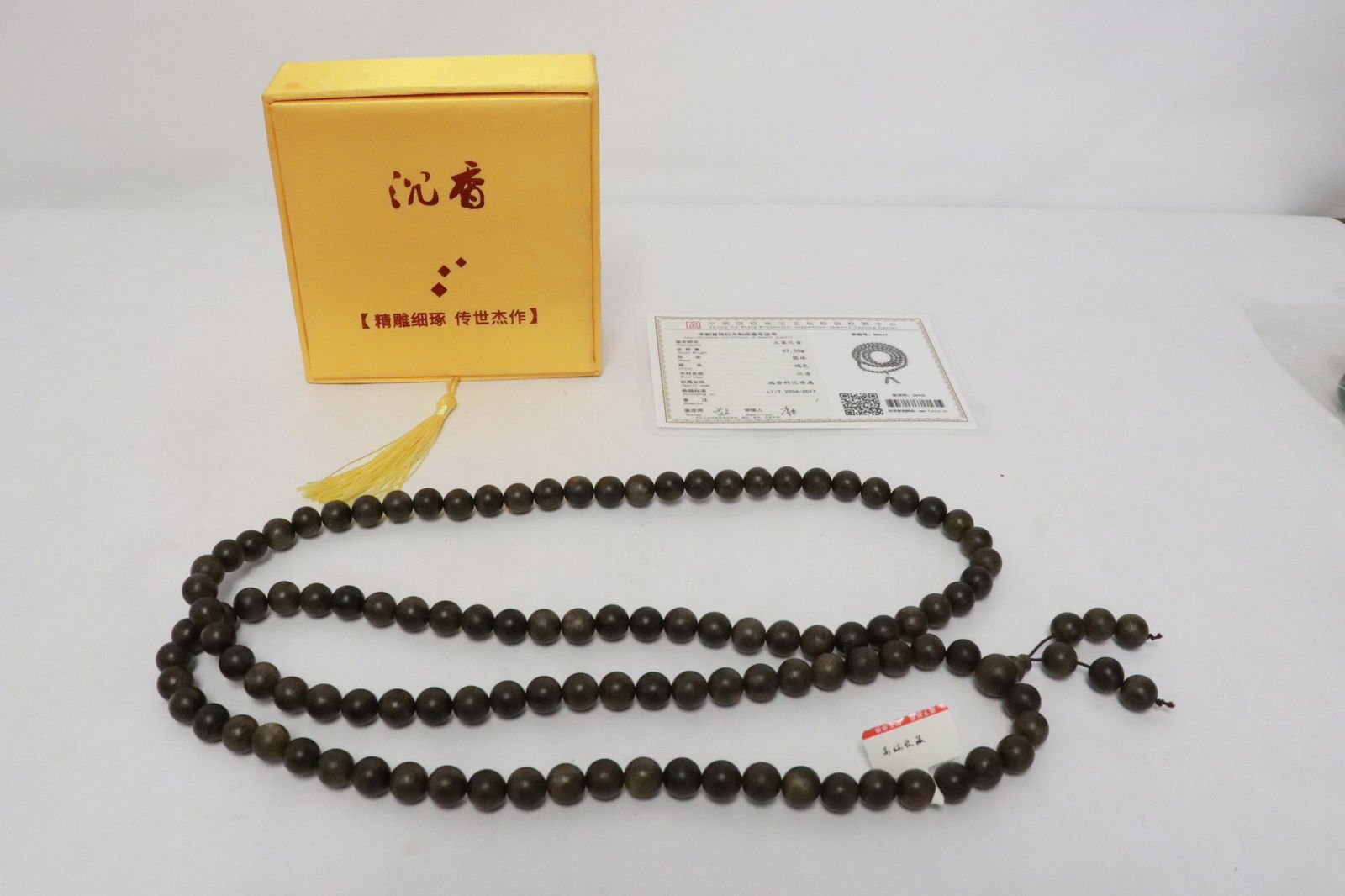 Chinese chenxiang wood bead necklace: Chinese chenxiang wood bead (0.35"x0.35"dia ea) necklace (44.5"L) (box:1.6"x4.7"x4.9")