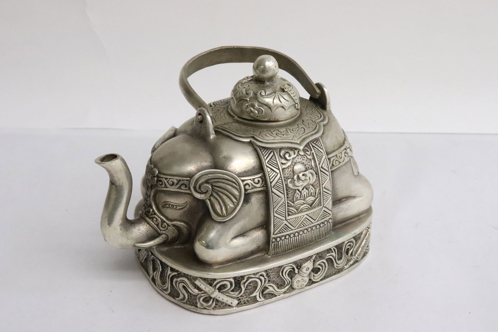 White bronze teapot in the form of elephant: White bronze teapot in the form of elephant, 4.15"x5.35"x3.65"