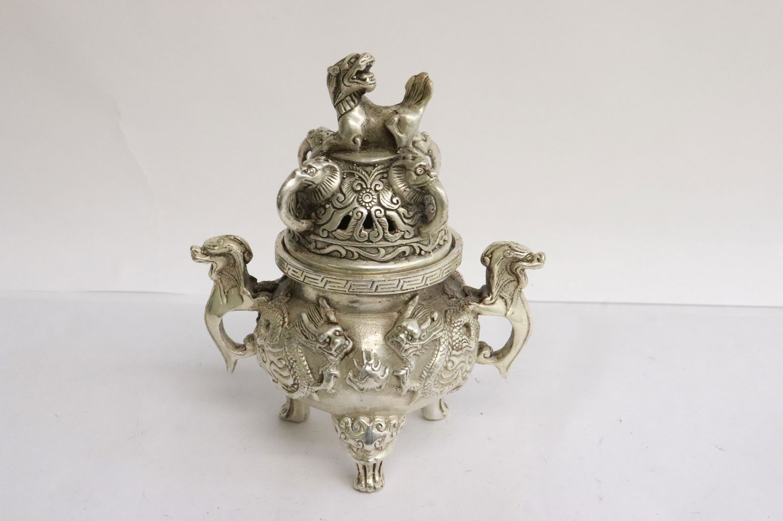 A fancy white bronze handled censer (1 of 9)