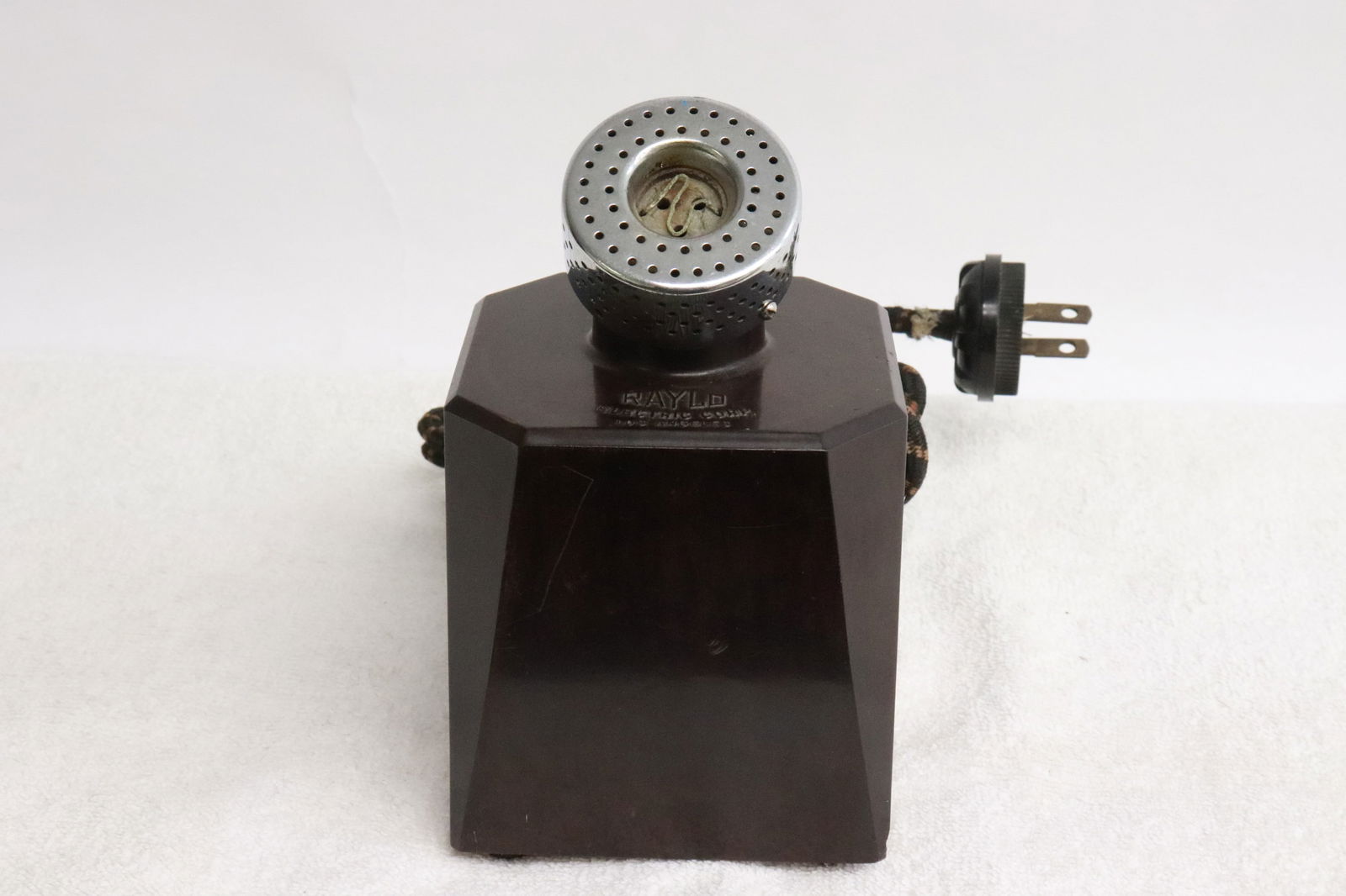 Large Bakelite cased electric lighters: Large Bakelite cased electric lighters with microphone motif on top, one side panel damage, 6.2"x3.6"x3.6"