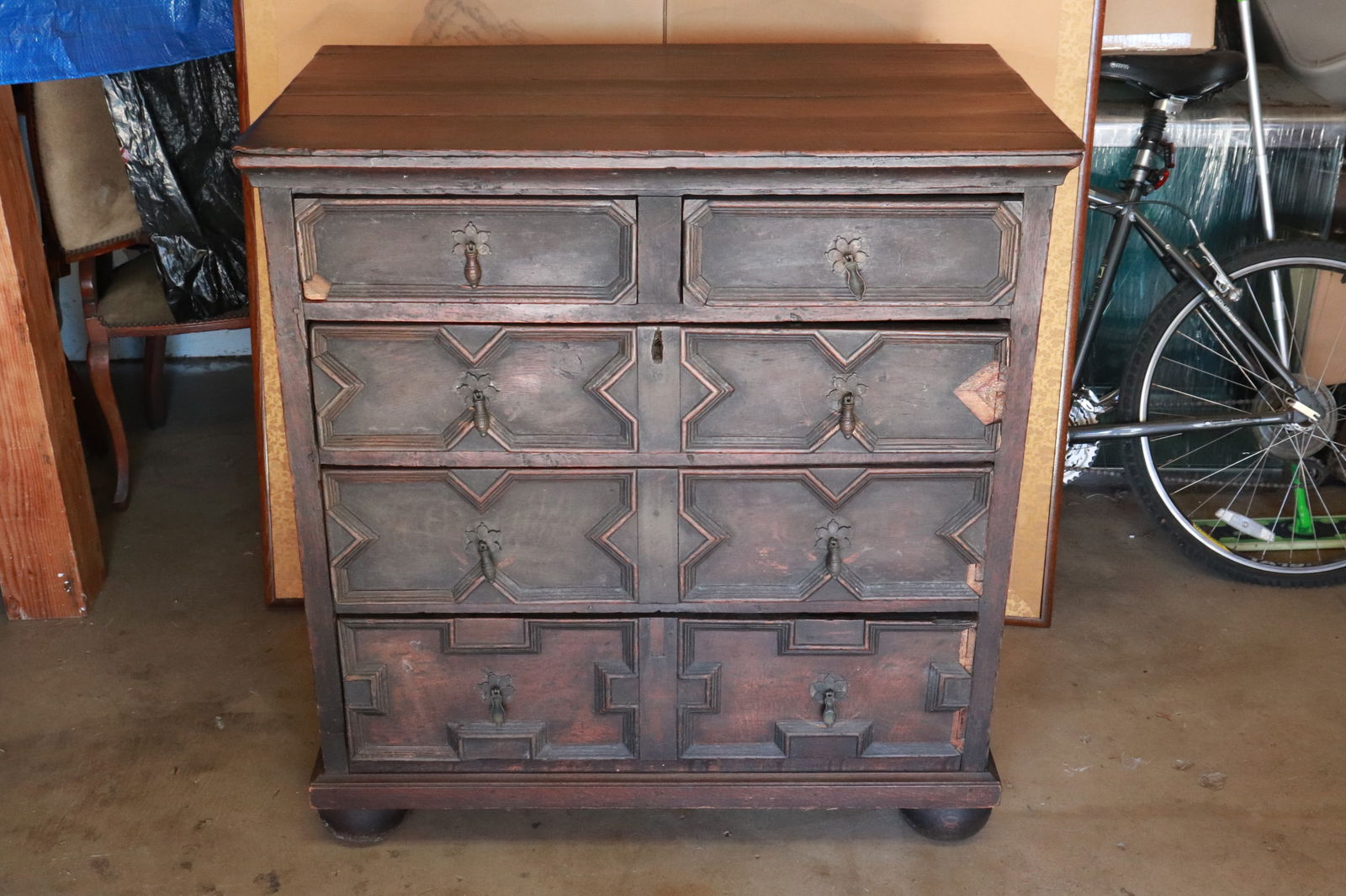 An 18th c. European mixed wood chest of drawers (1 of 10)