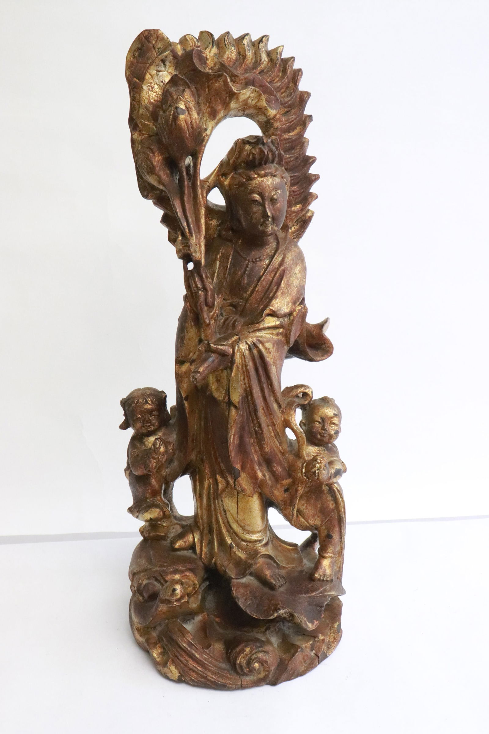 A 19th/20th c. Chinese gilt wood sculpture of deity: A 19th/20th century Chinese gilt wood sculpture of deity, 14.15"H
