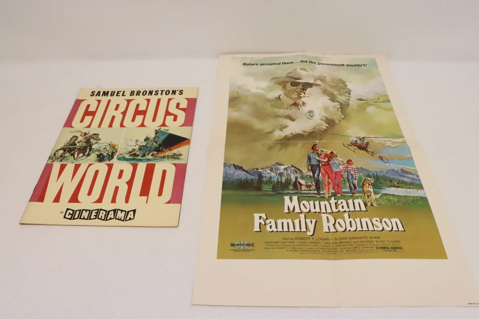 2 pieces: 2 pieces; a production booklet of "circus world", and a poster(18.5"x12") "mountain family robinson"
