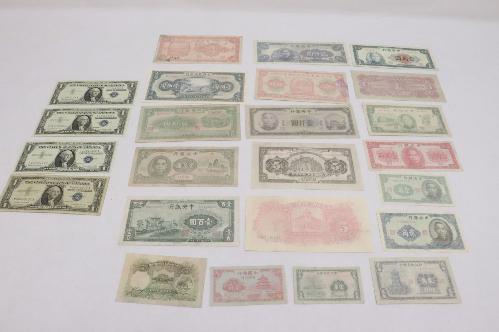 4 US $1 silver certificates, & lot of reproduction currency (1 of 9)