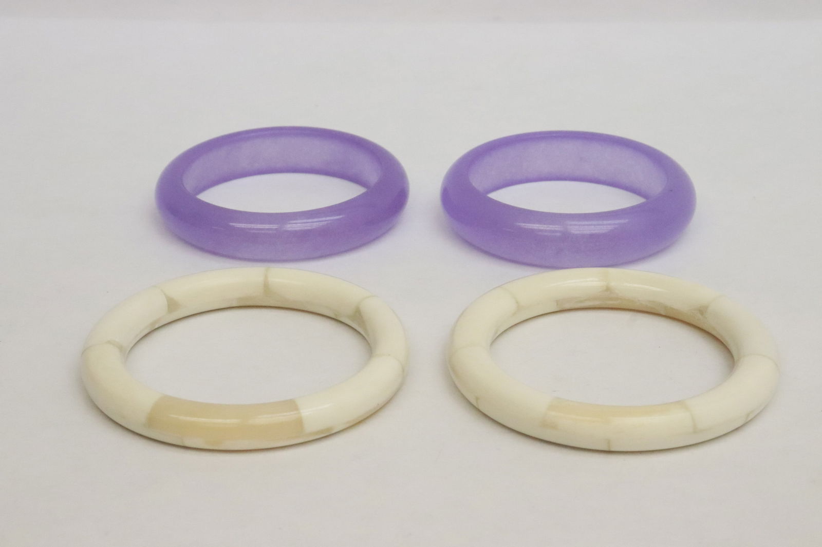 2 Peking glass bangles, 2 bone overlay bangles: 4 pieces; 2 Peking glass bangles (0.68"x3.13"dia, 0.63"x3.15"dia), 2 bone overlay bangles (0.38"x3.33"dia, 0.4"x3.8"dia)