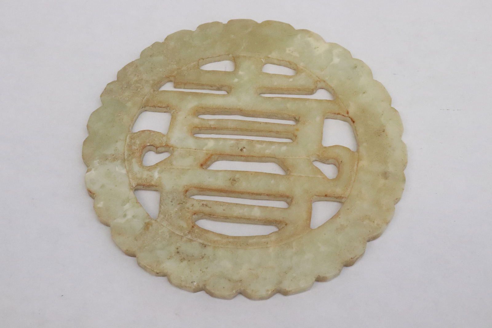 Pair jade like stone discs - 4