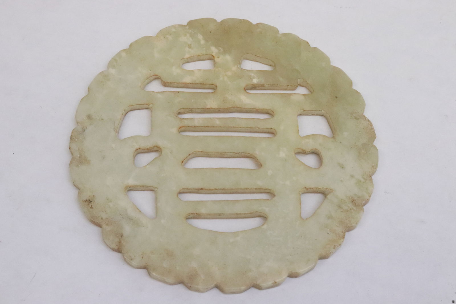 Pair jade like stone discs - 5