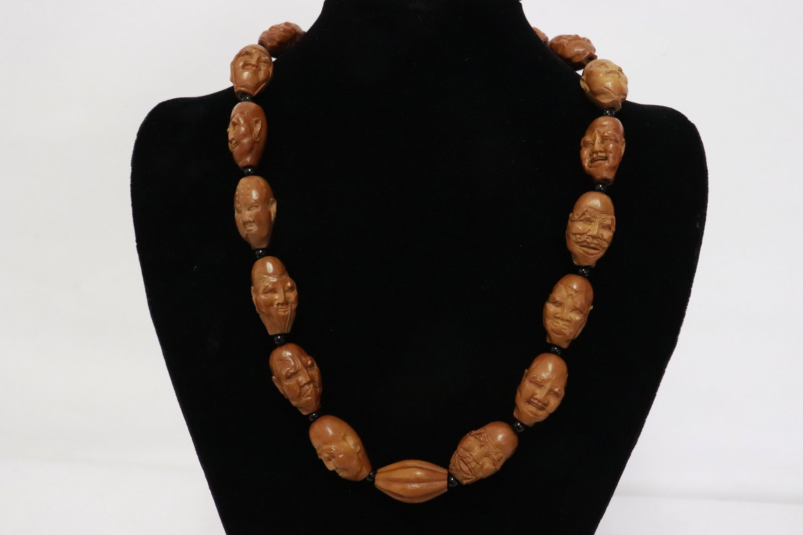 Necklace with nut carved bead: Necklace (22.3"L) with nut carved bead (1"x0.65"x0.6" - 1.1"x0.7"x0.65")