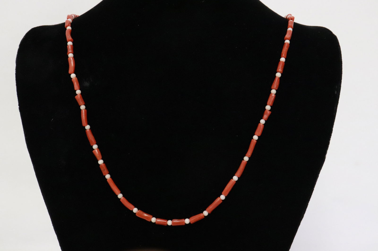 Coral like bead necklace: Coral like bead (0.25"x0.15"x0.18" - 0.48"x0.18"dia) necklace (26"L)