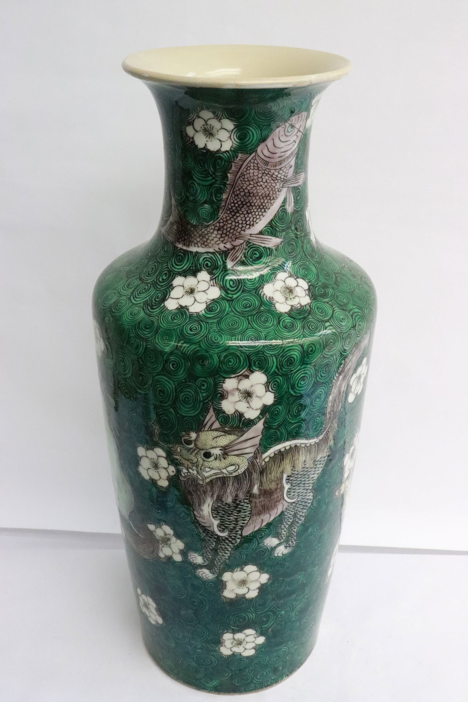 Chinese vintage green background famille rose vase: Fine Chinese vintage green background famille rose vase, top rim repair, 16.9"x7.1"dia