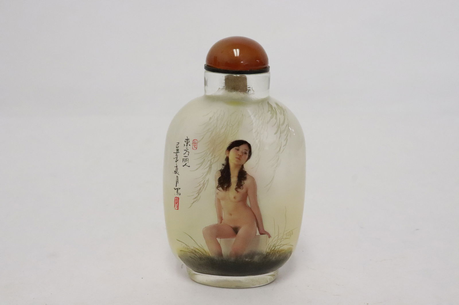 An inside painted snuff bottle: An inside painted snuff bottle, 3.6"x2"x1.1" (box:1.8"x4.15"x2.9")