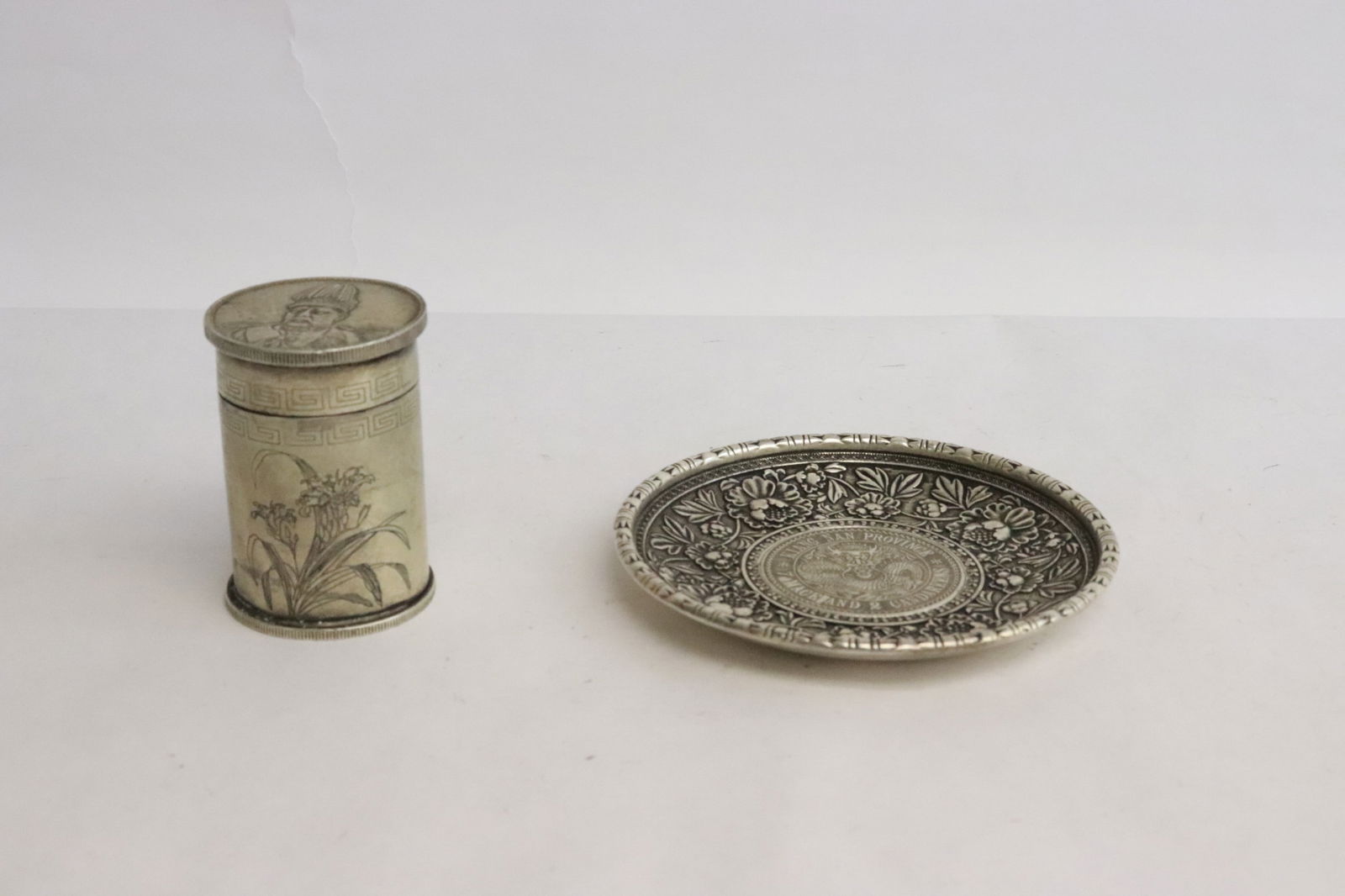 a small plate, and a box: 2 pieces; a small plate (0.5"x3.78"dia), and a box (2.25"x1.6"dia)