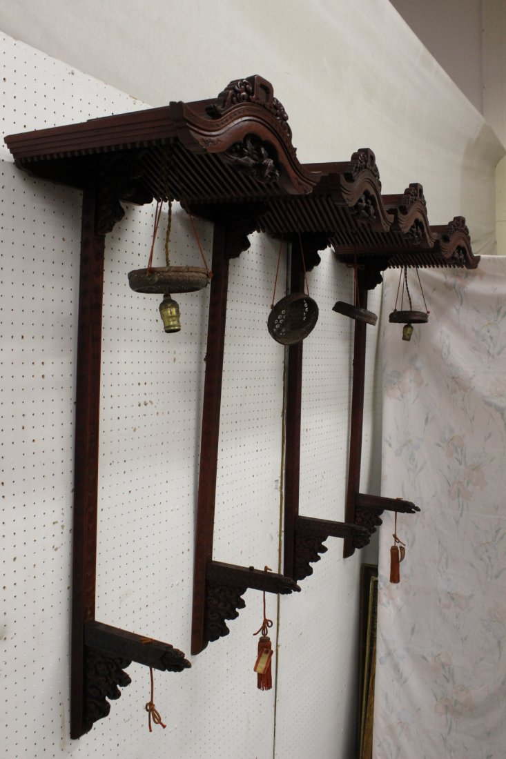 Set of 4 wood carved wall hanging lamps in roof motif: Set of 4 wood carved wall hanging lamps (52.5"Hx18"x17" each) in roof motif, the front carved with dragon motif