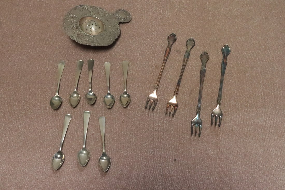 lot of silverplate pieces, and 8 Alpaca demi spoons: Fancy Dutch silverplate tea stiner, 4 s.p. cocktail forks (6.1"L ea), and 8 Alpaca demi spoons (3.4"L ea)
