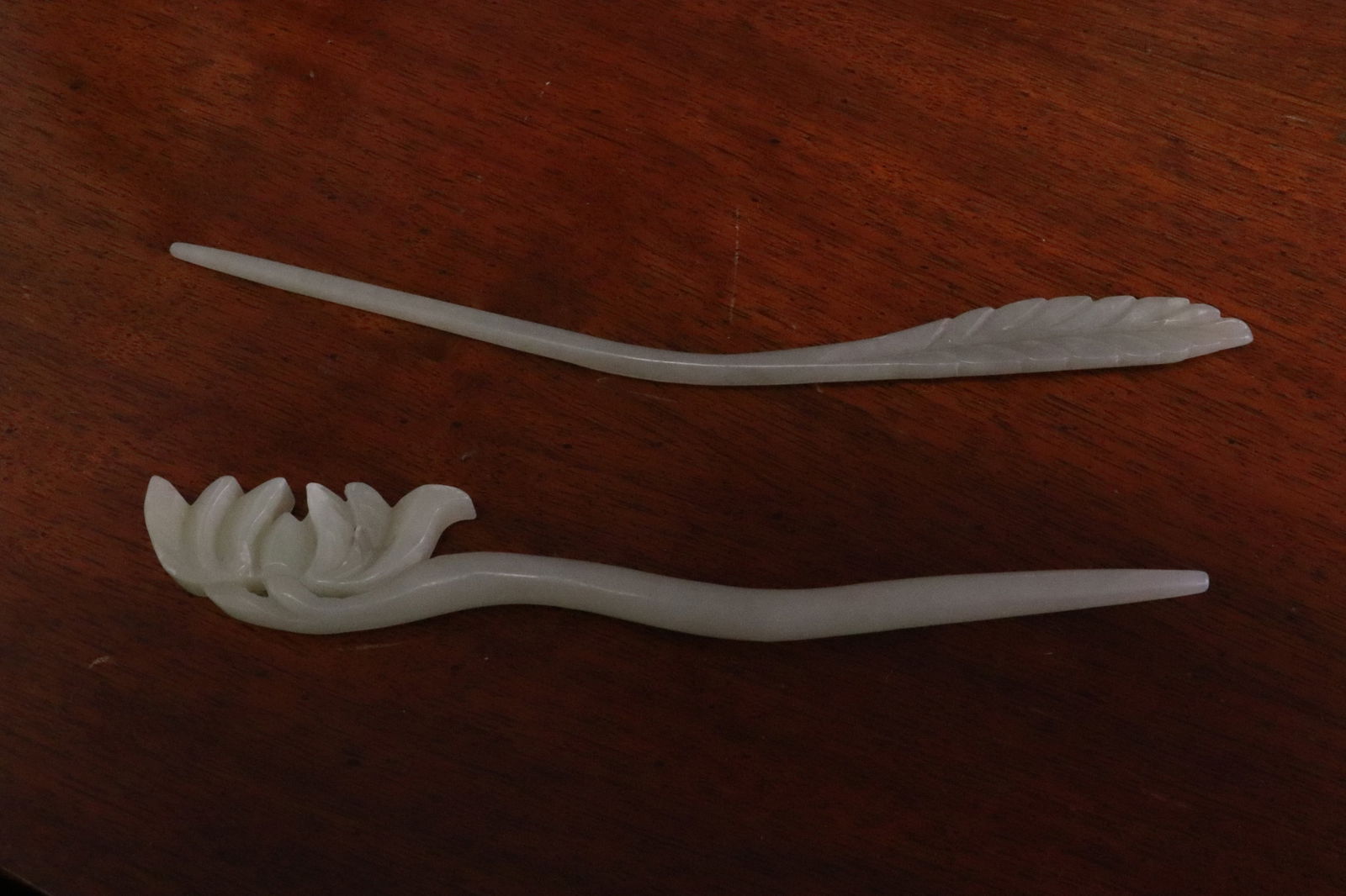 2 Chinese celadon jade hairpins: 2 Chinese celadon jade hairpins, 5.3"L, 6.2"L