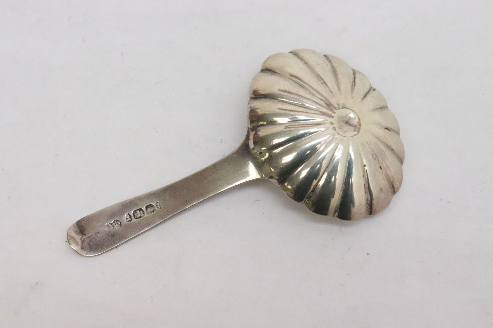 A Georgian sterling candy spoon - 2