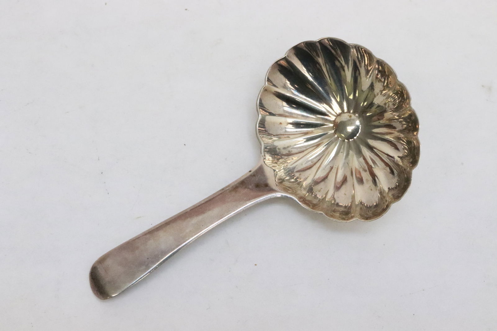 A Georgian sterling candy spoon - 5