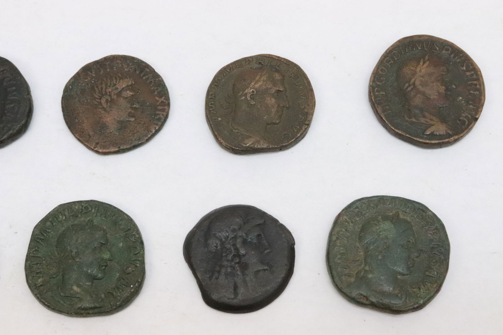 8 bronze coins(?) - 3
