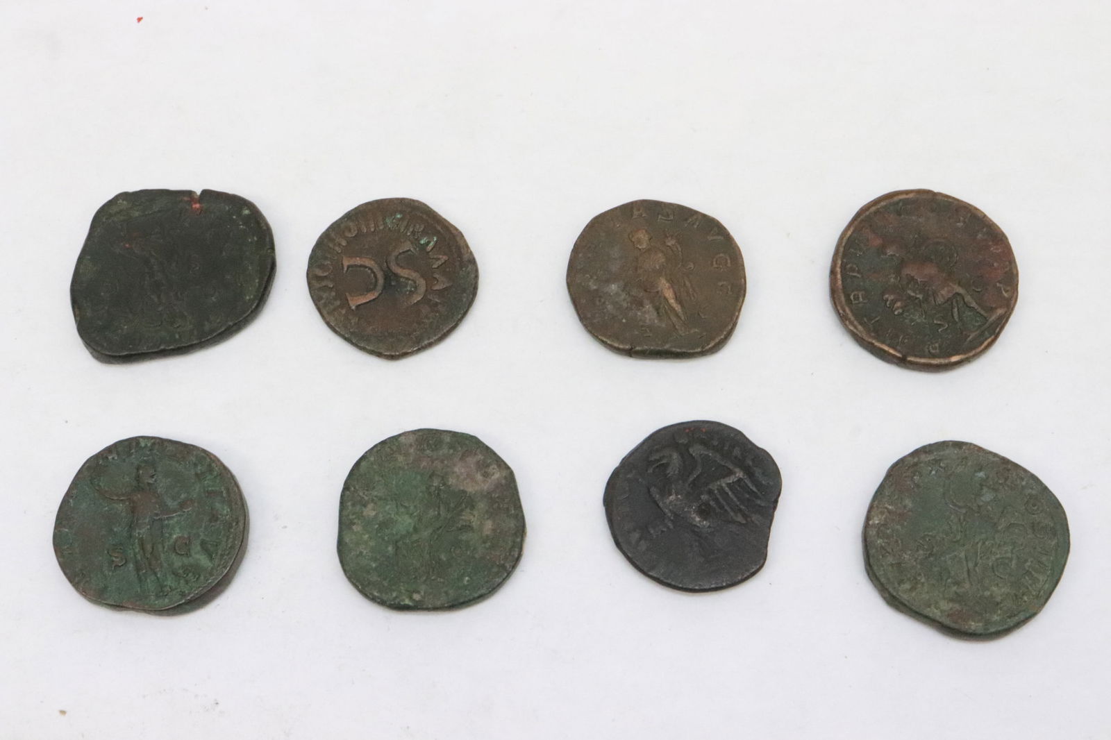 8 bronze coins(?) - 4