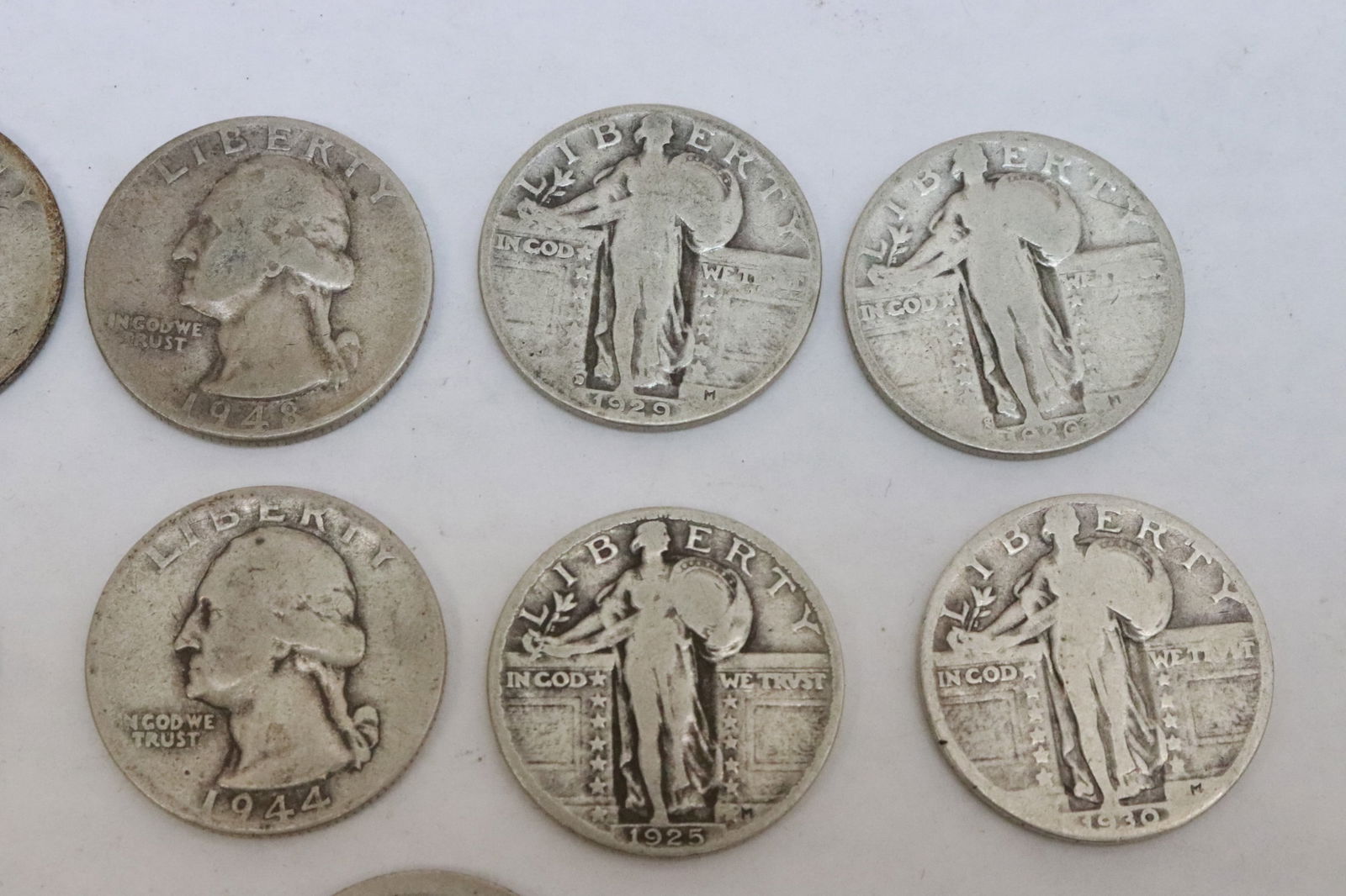 9 US silver quarters, various dates - 2