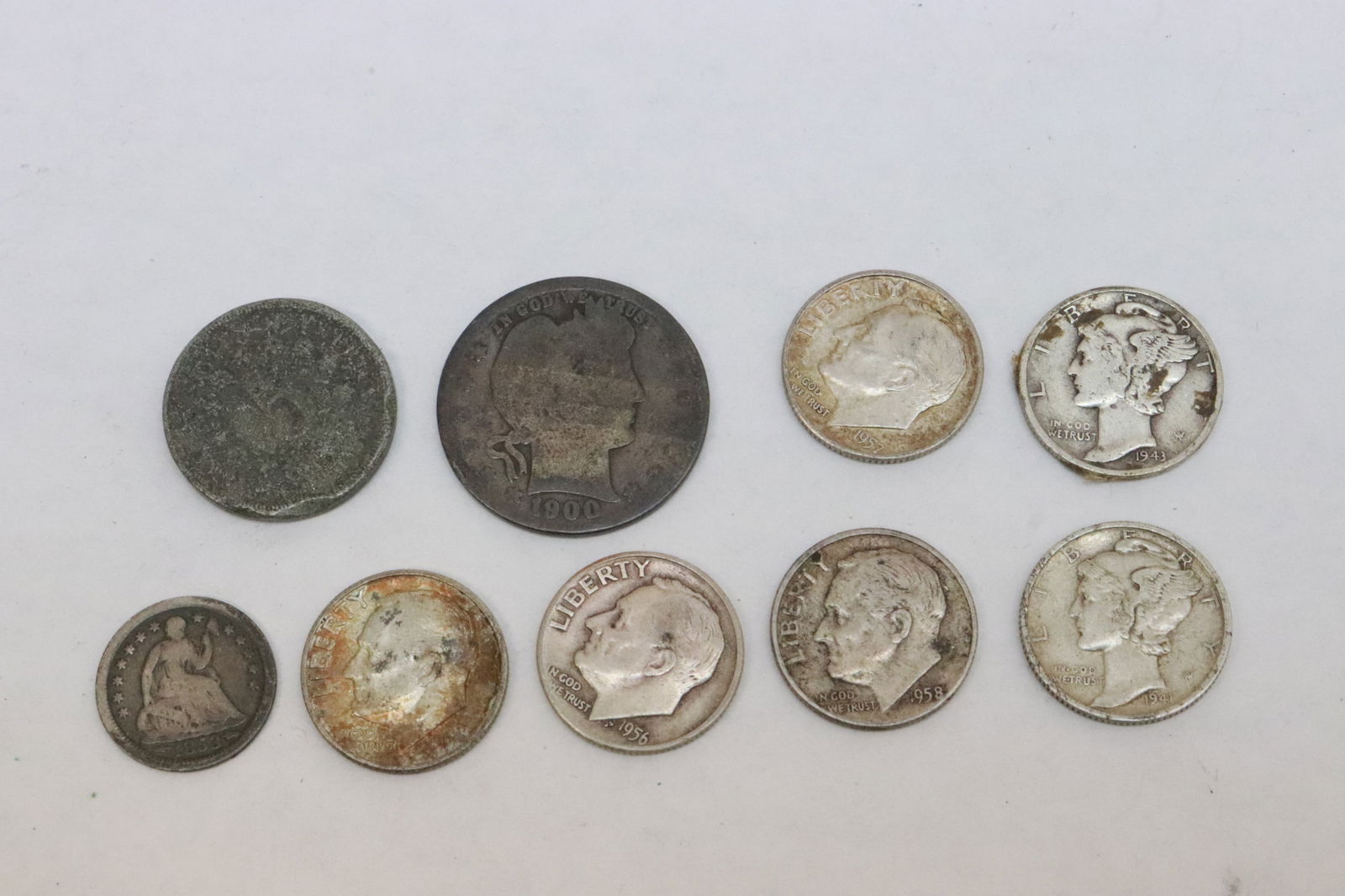 7 US silver dimes, and 2 US silver 5-cent coins: 7 US silver dimes, and 2 US silver 5-cent coins