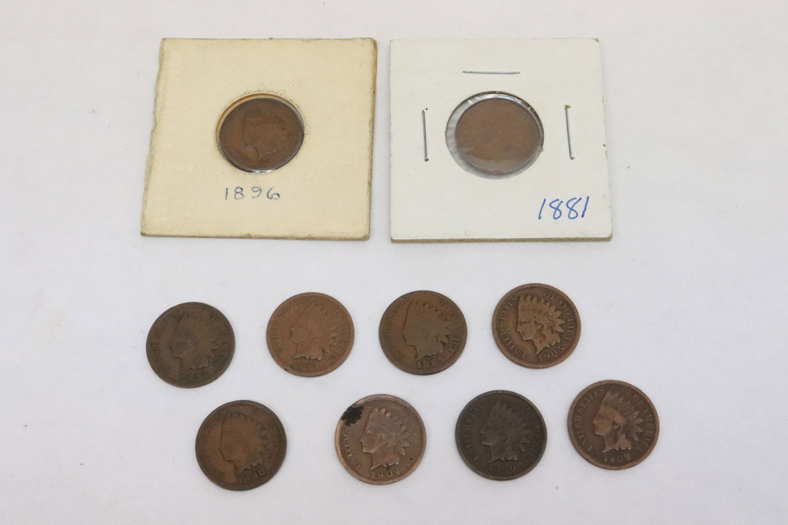 10 Indian head pennies: 10 Indian head pennies